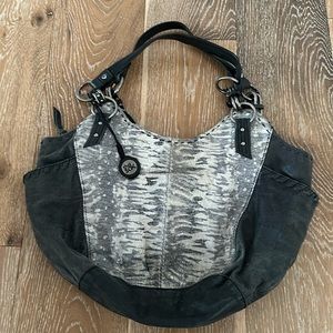 THE SAK distressed black leather and snakeskin print shoulder bag.